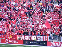 Fans celebrate at a Toronto FC match during the club's inaugural season in 2007 TorontoFCFans.jpg