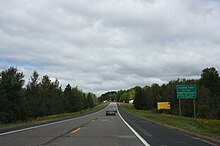 Photograph of the city limits sign showing