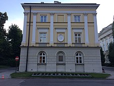 Warsaw University building where Chopin's family lived, 1817–27, embellished (center) with his profile and (foreground) with a piano keyboard formed of flowers, June 2018