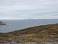 Green Island(s) from Saint Pierre island (France). Iceberg and Newfoundland in background.