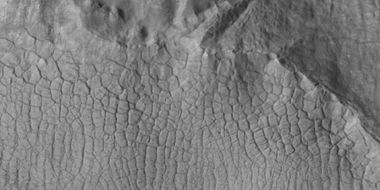 Close view of polygonal terrain near tongue-shaped flows, as seen by HiRISE under the HiWish program