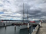 boat on a waterfront on a grey day.