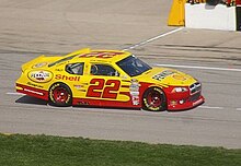 In the pit lane at the 2012 GEICO 400 at Chicagoland Speedway Sam Hornish Jr. Chicago 2012 (cropped).jpg