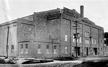 Black and white photo of rink's brick exterior