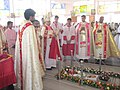 Kanjirappally bishop Mar Mathew Arackal and Prasant Payyappilly Palakkappilly at the tomb of Payyappilly Varghese Kathanar during his 81st Dukrana