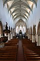 Das Mittelschiff von der Orgelempore aus fotografiert. Im Chor probt der Knabenchor capella vocalis aus Reutlingen. St Martin, Memmingen