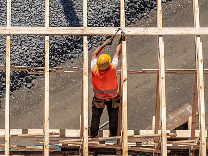 Carpenter working on a concrete formwork