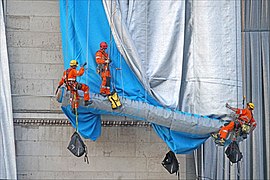 South-western facade of the Arc de Triomphe (Avenue Kléber) being wrapped