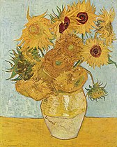 Zwölf Sonnenblumen in einer Vase