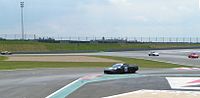 Der Complexe du Lycée auf dem Circuit de Nevers Magny-Cours mit einem Ford GT40, 2 Porsche 911 und meinem Honda NSX