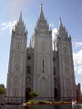 Salt Lake Temple with couple taking wedding photos, Salt Lake City