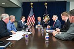 President Donald J. Trump, joined by Texas Gov. Gregg Abbott, Lt. Gov. Dan Patrick and FEMA officials, attends a briefing on the continuing Hurricane Harvey relief and recovery efforts, during a meeting in the Signature Flight Support facility at Dallas Love Field, Wednesday, October 25, 2017, in Dallas, Texas. Gov. Abbott thanked President Trump for his commitment to Texas.