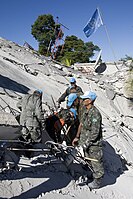 United Nations Stabilization Mission in Haiti (MINUSTAH) peacekeepers trying to find survivors in the wreckage of a building Image: UNDP.