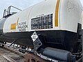 Image 17Trains carrying hazardous materials display information identifying their cargo and hazards. This tank car carrying chlorine displays, among other markings, a U.S. DOT placard showing a UN number that identifies the hazardous substance. (from Train)
