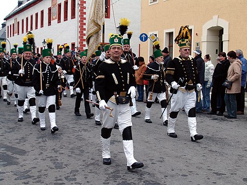 Miners in their parade uniform (miners' parade in Marienberg, Saxony, 2005) BergparadeMarienbergDez2005.jpg