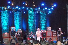 The original line-up of Magnapop reunited for a benefit concert for record store Criminal Records in 2011. From left to right: bassist Shannon Mulvaney, drummer David McNair, singer Linda Hopper, and guitarist Ruthie Morris. Magnapop reunion 2011.jpg