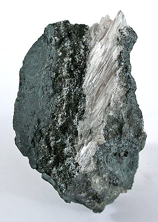 <span class="mw-page-title-main">Mendipite</span> Oxyhalide of lead. Rare mineral found in the Mendip Hills