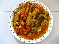 Machher jhol in an Odia style is a traditional Bengali and Odia spicy fish stew. MACHHA HALADI.jpg