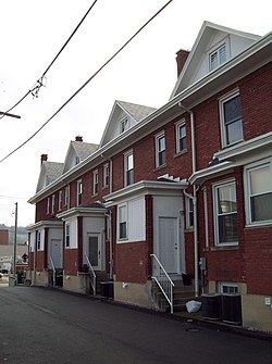 Terraced three-story building with porches