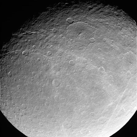 Image of the wispy hemisphere, showing ice cliffs - Powehiwehi (upper center); chasmata stretch from upper left to right center - Onokoro Catenae (lower right)