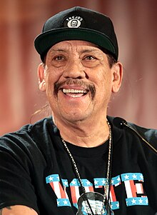 Danny Trejo speaking at the 2017 Phoenix Comicon in Phoenix, Arizona.