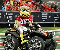 Freddie Falcon riding an ATV on the pitch in 2012 Freddie Falcon.JPG