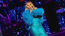 Carey performing "Never Too Far" as part of the #JusticeForGlitter medley of her Caution World Tour (2019) MariahRAH270519-60 (49620843348).jpg