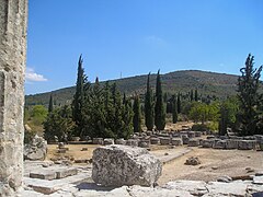 Sacred grove of cypress trees and columns, Nemea, Neme465.jpg