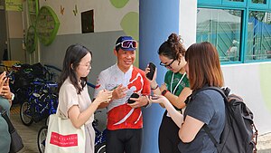 Dr Hing Siong Chen giving interview to media at APSN Delta Senior School on 16 Apr 2023