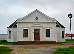 The old Dutch Reformed Church in Somerset West is situated between Church and Victoria Streets, not far from the main street. The congregation of Hottentots Holland was established in 1819, three years before the town of Somerset West came into being. Type of site: Church Current use: Church. The Church was consecrated in 1820 by the Rev. Meent Borcherds of Stellenbosch and was restored in 1863 and 1963. It is proclaimed a monument on account of its history and its remarkable architecture