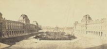 Réunion des Tuileries au Louvre 1852–1857 Getty Museum vol1 05 View of the Cour Napoléon toward the Tuileries.jpg