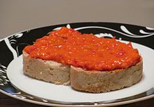 Ajvar atop bread Ajvar (10844189665).jpg