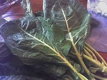 Collard greens, cleaned, uncut, ready for cooking Collard greens.jpg