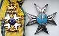 Знак і зорка ордэна Мяча ступені камандора I класа.