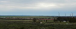 A skyline of the town of Gouda in the Western Cape, South Africa. Part of the Gouda Wind Farm can be seen to the far right of the picture.