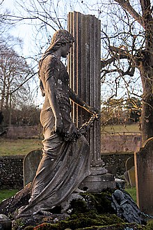 This memorial, quoted as a "lush young maiden" by Sam Mortlock in his 'Popular Guide to Suffolk Churches', is on the tomb of Herbert Davies, Lord of the Manor of Herringswell, who died in 1899. Memorial in Herringswell churchyard - geograph.org.uk - 1128443.jpg