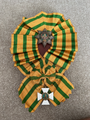 The Grand Cross sash, badge and star of the order.