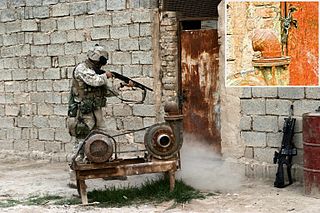 <span class="mw-page-title-main">Door breaching</span> Methods used by military, police, firefighters to forcibly enter a structure