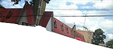 A red, steeply-pitched roof