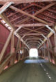 The inside of the bridge showing the Burr arch truss