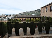 View of the Patio de Machuca from the south (the trimmed cypresses stand in for the lost porticos)