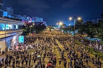 Stand-off between protesters and police near Sha Tin Jockey Club Swimming Pool. Night of 14 July.