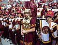 Spirit of Troy's drum major stands in the middle of the rest of the band