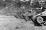 4th Armoured Brigade Matilda II and M3 Grant tanks firing small calibre weapons during a demonstration.