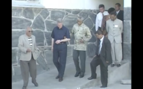 Bill Clinton on a tour of Robben Island pictured with Nelson Mandela, in 1998.