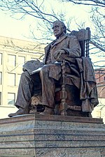 Bronze statue of a seated man