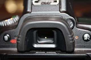 <span class="mw-page-title-main">Viewfinder</span> System through which the photographer looks to compose and focus the picture