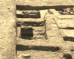 Archaeological site with remains of structures