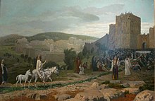 Jesús munta un ase a Jersualem i una gran multitud el rep.