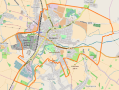 Mapa konturowa Strzelina, w centrum znajduje się punkt z opisem „Parafia Ewangelicko-Reformowana w Strzelinie”